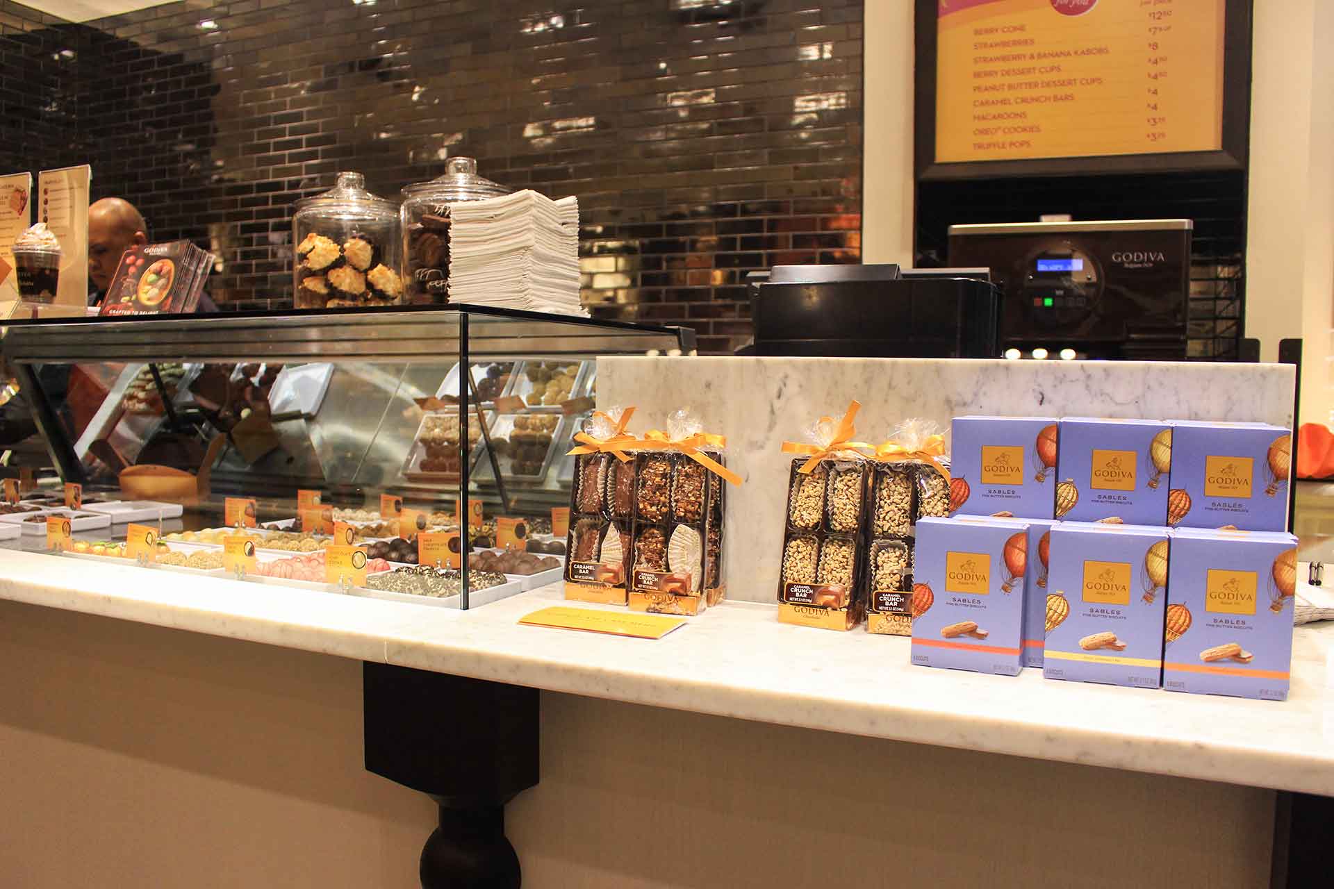 wrapped chocolate on counter at godiva